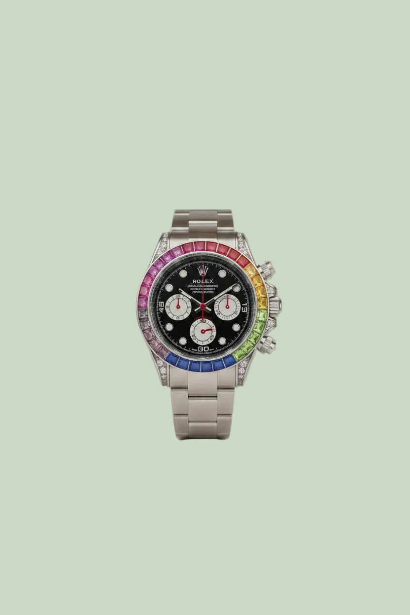 A Rolex Daytona watch with a black dial and a colorful rainbow bezel