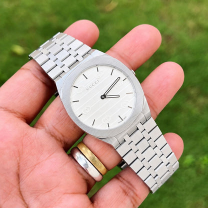 GUCCI- 25H's STREAMLINED SILHUETTE
